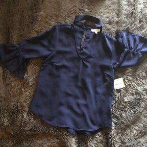 Dark blue blouse.